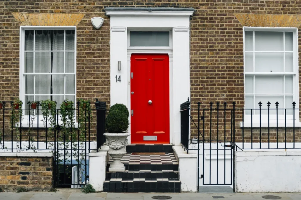 A freshly painted red front door